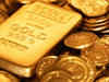 Gold cautious in trade as dollar retreats