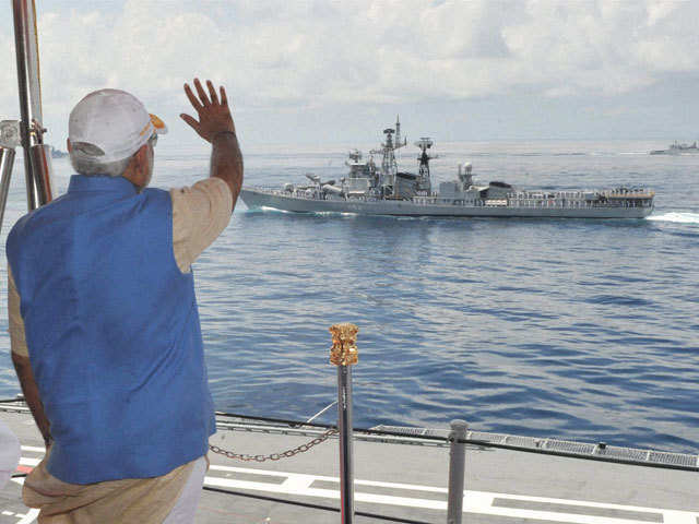 PM waves at a ship from INS Vikramaditya