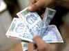 Rupee hits two-week high of 66.51 against USD