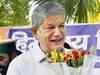 Herald protest: Injured Harish Rawat leads march on wheel chair