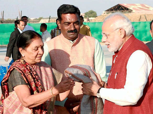 Gifting shawl to PM Modi