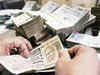 Rupee edges higher, ends at 66.35 against US dollar