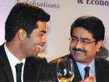 Karan Johar, Kumar Mangalam Birla at an event