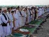 People offer Eid al-Fitr prayers in Peshawar