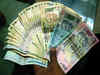Rupee ends at 66.39 against dollar