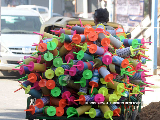 Vendor sells thread holder for kites