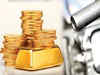 Gold edges higher, crude oil price slumps to 12-year low