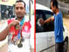 Gold-medalist para-athlete washes cars for a living