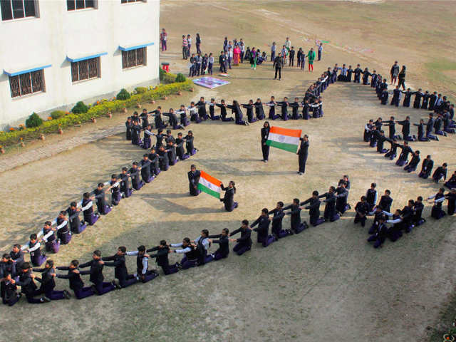 ​Students make a human chain in the shape of 'Indian Map'