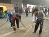 AAP workers clear garbage off roads in Delhi
