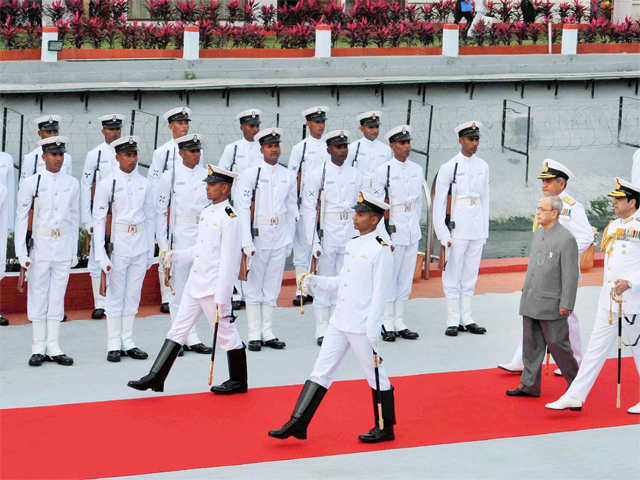 Accepting the guard of honour