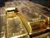Gold touches new high of $1,052 per ounce