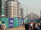 Labourers work at Commonwealth Games village 