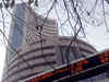Sensex ends flat in volatile session; Nifty scales 7200