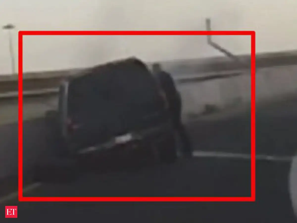 Watch: Texas cop saves man from burning SUV - The Economic Times Video ...
