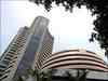 Market close: Sensex ends flat; Metals, banks up