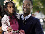 Chris Rock holds his daughter Zahra Savannah 