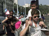 Brad Pitt carries adopted son Maddox