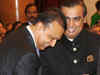 Mukesh, Anil Ambani display bonhomie as President honours their father