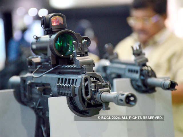 Assault rifles, handguns on display
