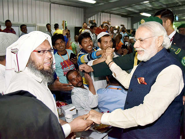 PM Modi shares snack with Indian workers in Riyadh