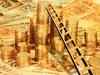 Gold rises in futures trade on global cues