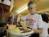 Waitress with onion rings