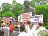 BJP leaders protest at the Gandhi statue in Parliament