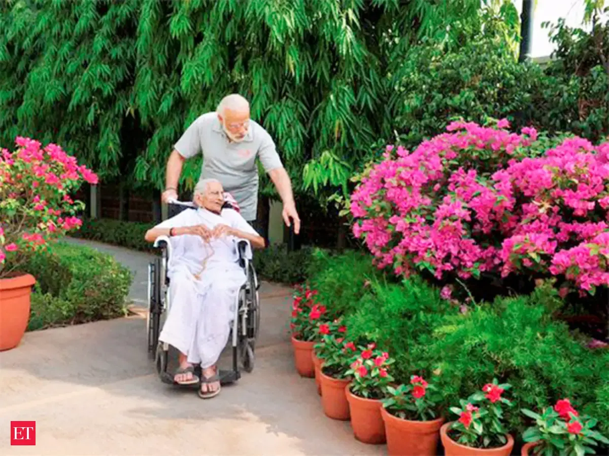 PM Narendra Modi's mother visits his official residence for the first ...