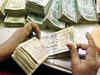 Rupee hits 2 month low, ends at 67.44 vs dollar
