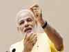 Modi praises Sonowal for performing his duty despite polls