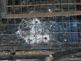 The windshield of the police van of Karkare