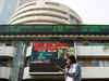 Sensex halves early gains; Nifty50 tests 7,800