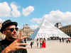 French artist makes Louvre pyramid disappear!