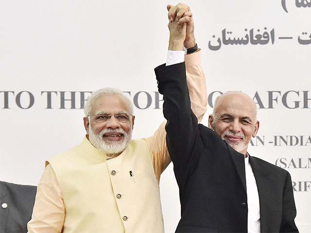 PM Modi & Ghani raise each other's hands