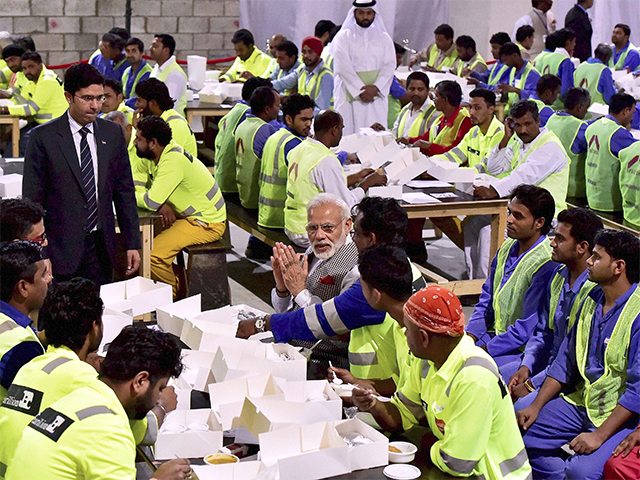 PM Modi talks with Indian workers