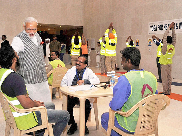 PM Modi interacting with the Indian Workers