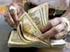 Rupee ends at 3-week high of 66.97, up 28 paise