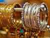 Gold, silver stay shaky on global cues, soft demand