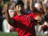 Tiger Woods celebrates