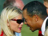 Tiger Woods shares a moment with Elin Nordegren