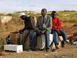 African would-be immigrants wait near the CETI in Spain