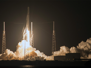 SpaceX propels cargo to space station, lands rocket