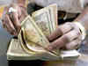 Rupee gets a boost, RBI steps in to cap gains