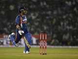 Sachin Tendulkar runs between the wickets