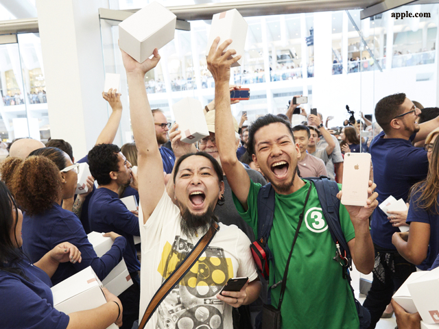 Customers at the new Apple store