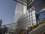 Workers put the final touches to Burj Dubai