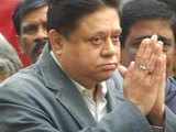 Chandan Basu gestures to supporters
