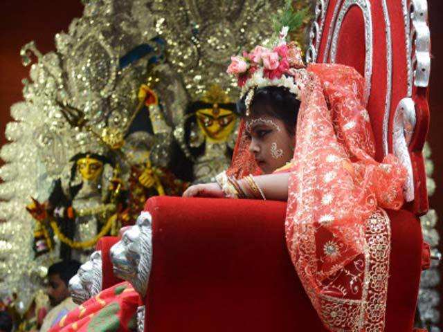 Kolkata girl dressed as the Hindu goddess Durga