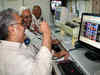 Sensex climbs 100 points, Nifty reclaims 8,700; Wipro tanks 3%